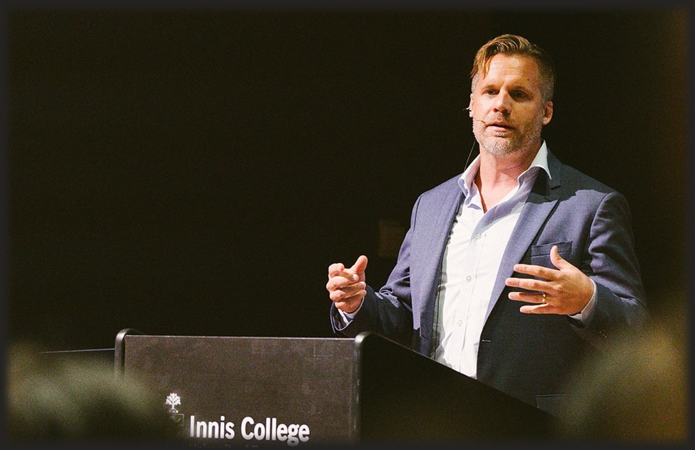Adam Eric Robbert speaking at Innis College, University of Toronto